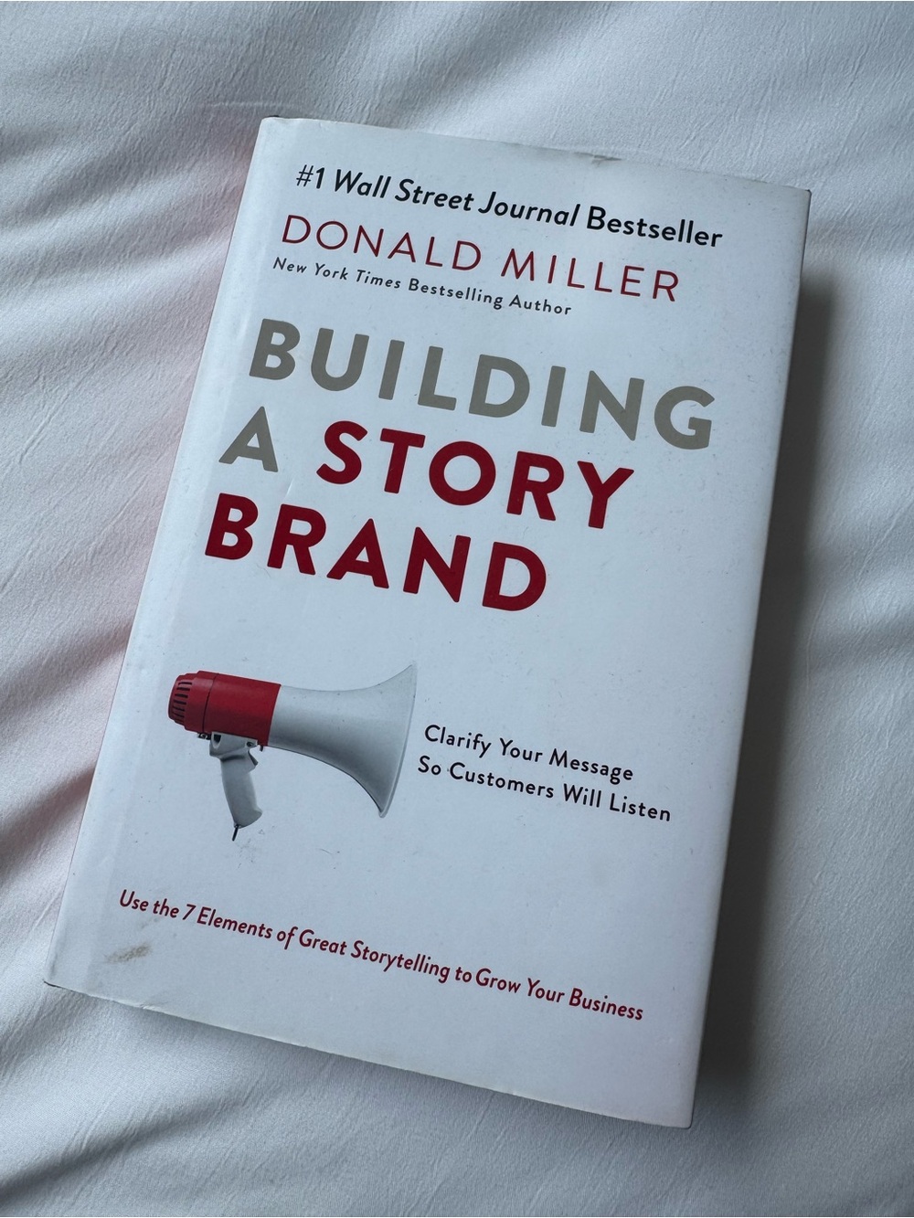 Building a StoryBrand by Donald Miller - White Cover with Red Accents